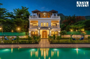 StayVista's Ashwamedha Manor - Mountain-Side Luxury Retreat with Outdoor Pool, Jacuzzi, Spa & Steam Room, and Indoor Activities